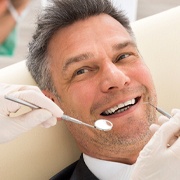Man at dentist with dental implants in Atlanta