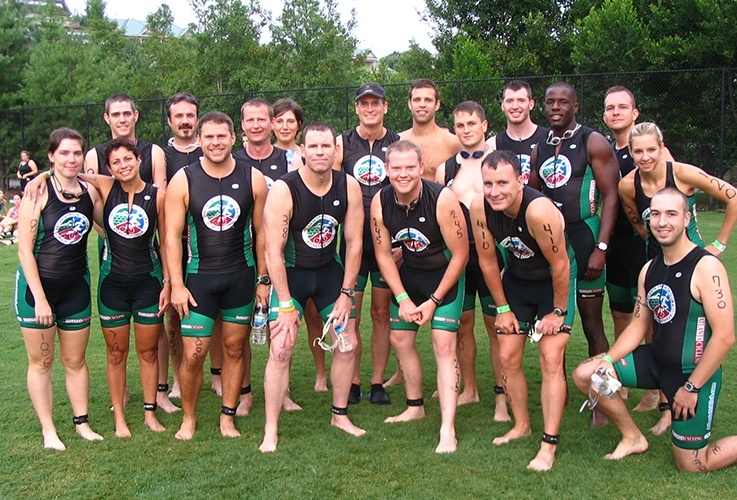 Dr. Pate posing with racing team