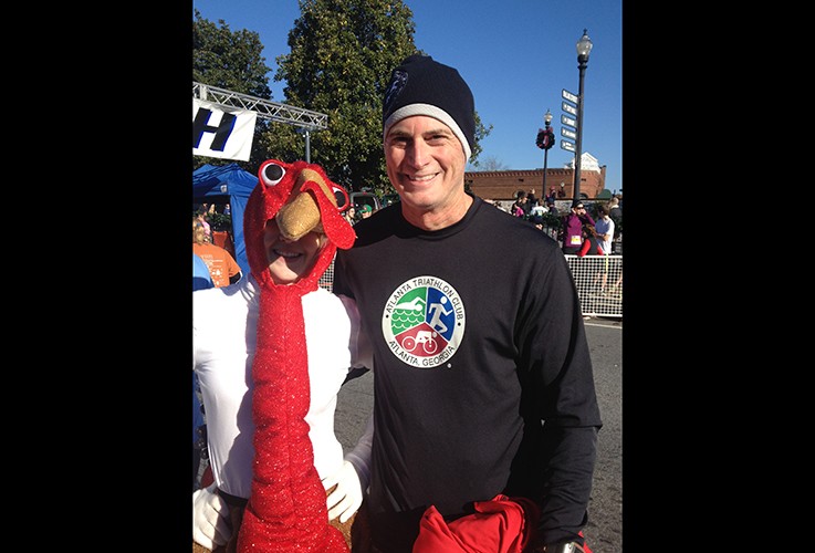 Dr. Pate posing with a mascot