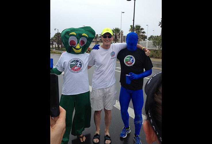Dr. Pate posing with Gumby and another mascot