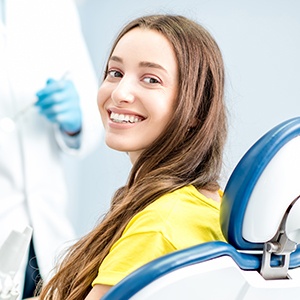 Smiling woman in dental chair