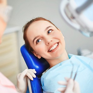 Smiling woman in dental chair