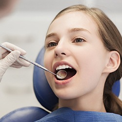 Child receiving dental exam