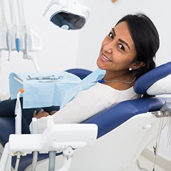 Female dental patient looking back and smiling