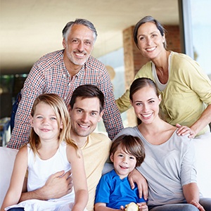 Three generations of family smiling together