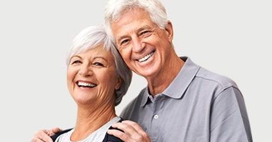 Senior man and woman smiling together