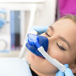 Female patient with nitrous oxide nasal mask