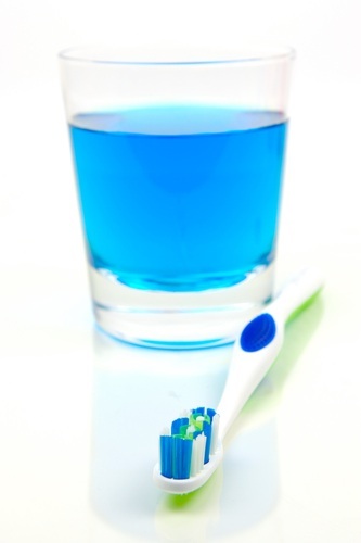 flouride cup and toothbrush